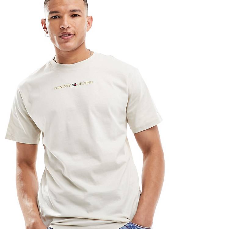 Tommy Jeans classic gold linear logo t-shirt in beige | ASOS