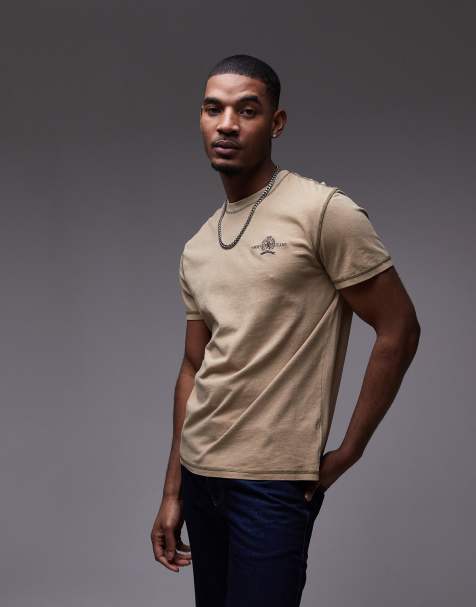 Tommy Jeans crest logo t-shirt in tan - view 1