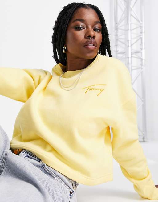 Tommy Jeans cropped signature logo crew neck sweater in yellow