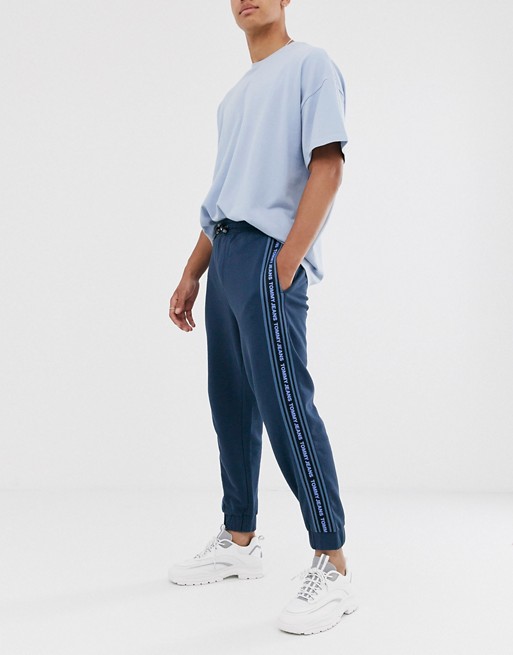 Tommy Jeans cuffed joggers in washed blue with side taping