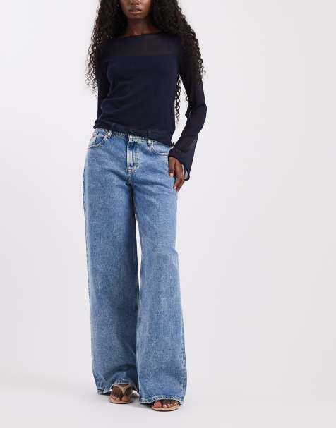 Tommy Jeans Daisy jeansy o luźnym kroju z niskim stanem w średnim odcieniu denimu - view 1