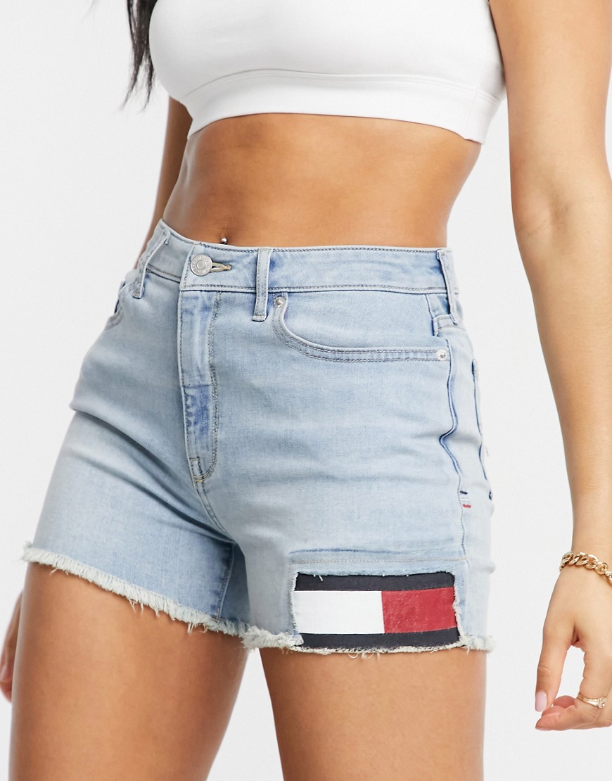 Tommy Jeans distressed denim shorts with flag detail in light wash-Blues