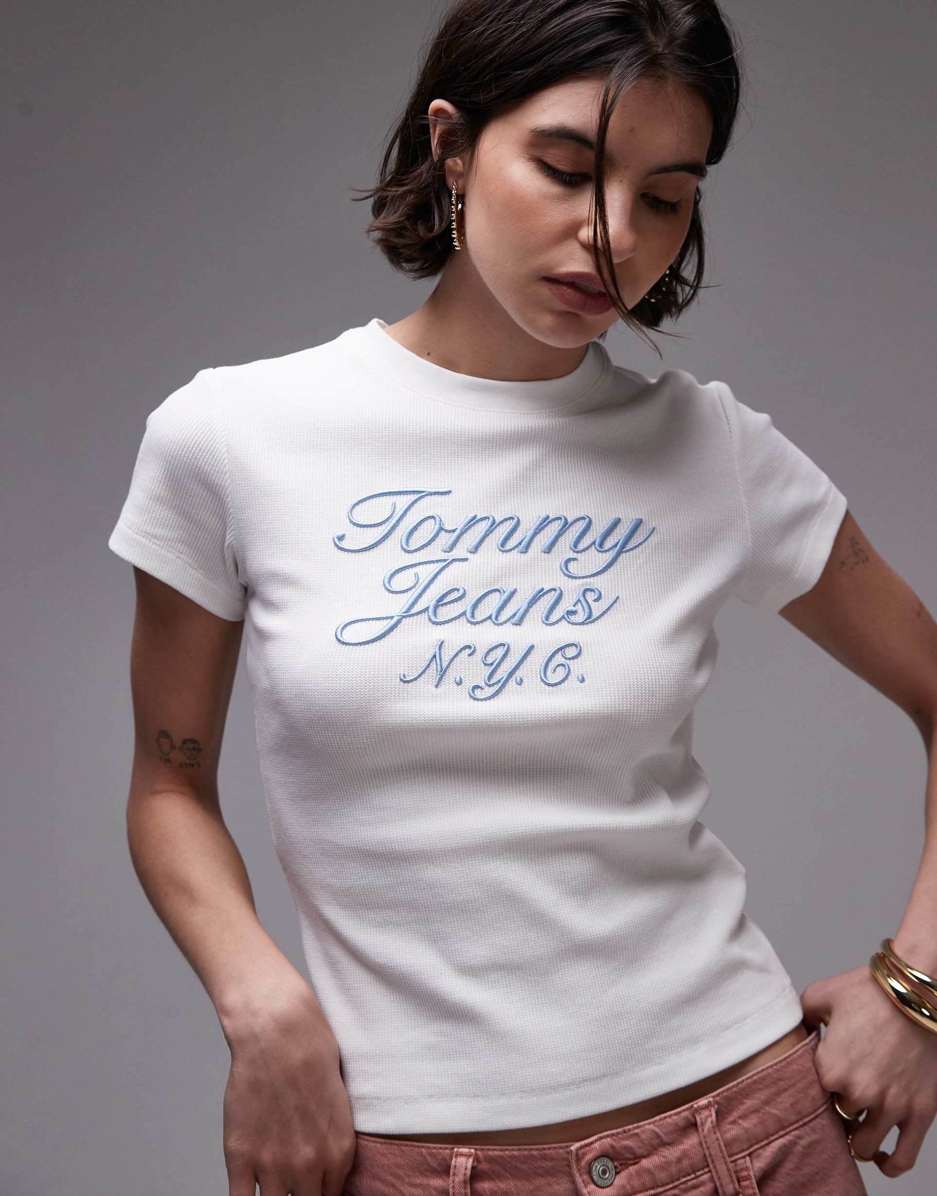tommy jeans embroidered swirly logo t-shirt in white and baby blue