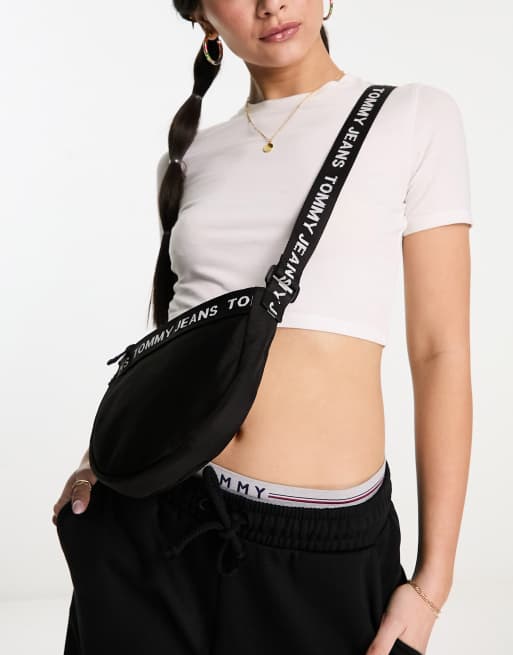 Tommy Jeans essential cross body moon bag in black | ASOS