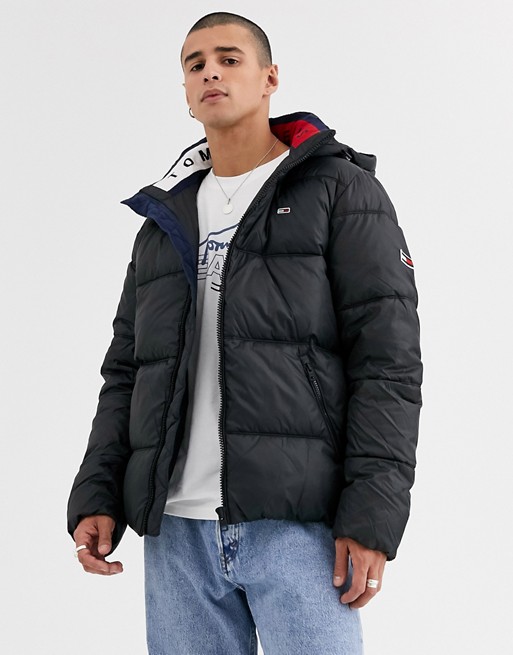 Tommy Jeans essential hooded puffer jacket in black with large flag logo