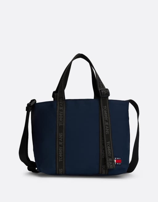 Tommy Jeans – Essential – Tragetasche in Dunkelblau mit sich wiederholendem Logo