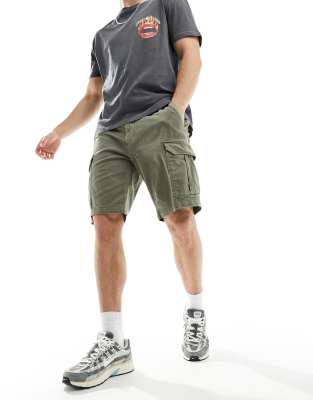 Шорты-карго Tommy Jeans от Ethan оливково-зеленого цвета 14390₽