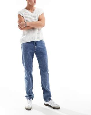 Tommy Jeans – Ethan – Locker geschnittene Jeans in mittlerer Waschung mit geradem Schnitt