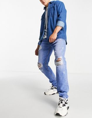 Tommy Jeans Ethan relaxed straight fit heavy distressed jeans in light wash