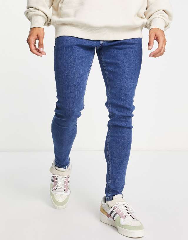 Tommy Jeans Finley cotton blend super skinny jeans in blue - MBLUE