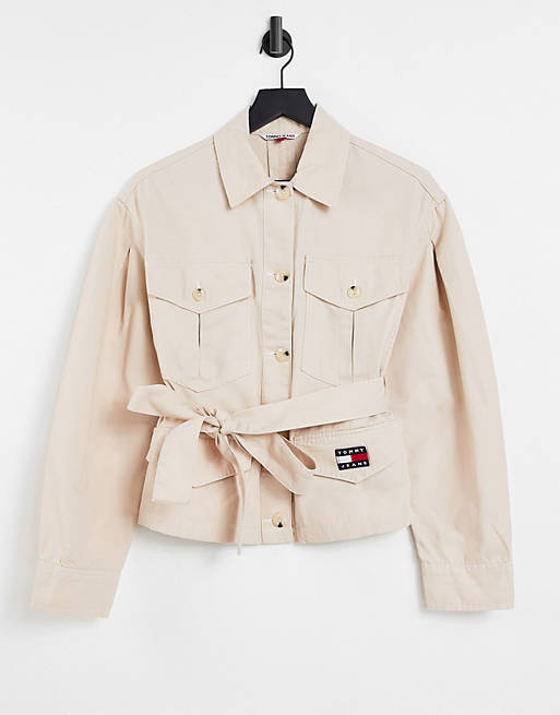 Torrent housewife Ace Tommy Jeans flag logo belted overshirt in beige | ASOS