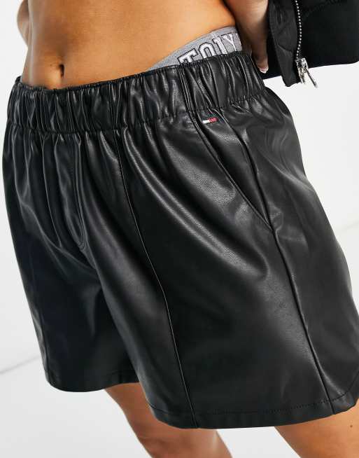 Tommy Jeans flag logo faux leather pull on shorts in black