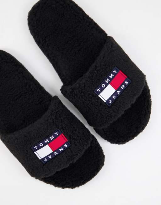 Tommy Jeans flag logo furry sliders in black ASOS