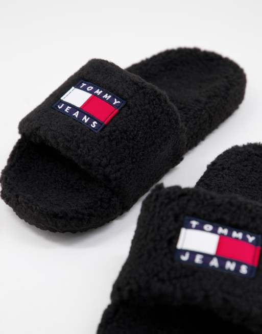 Tommy Jeans flag logo furry sliders in black ASOS