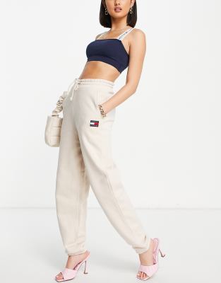 Tommy Jeans flag logo jogger in beige - ASOS Price Checker