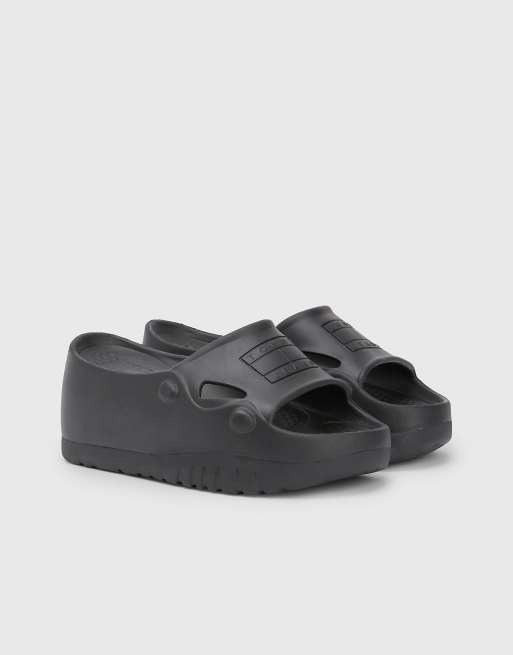 Tommy Jeans – Freedom – Slider in Schwarz mit flacher Plateausohle 