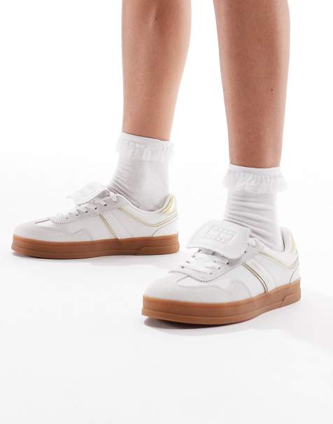 Tommy Jeans Greenwich trainers with gum sole in white and gold - view 1
