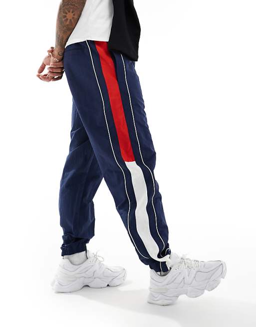 Tommy Jeans International Games tracksuit bottoms in navy | ASOS Tommy Jeans International Games tracksuit bottoms in navy | ASOS