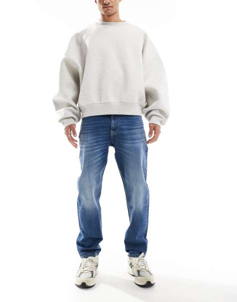Tommy Jeans – Isaac – Ciemnoniebieskie jeansy o luźnym kroju ze zwężanymi nogawkami - view 1