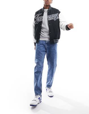 Tommy Jeans Isaac relaxed tapered jeans in mid wash - ASOS Price Checker