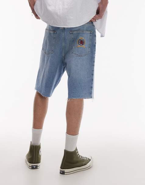 Tommy Jeans – Isaac – Relaxed-Fit-Jeans-Jorts in heller Waschung mit Wappenmotiv auf der Tasche - view 1