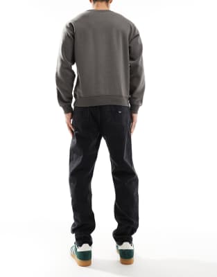 Tommy Jeans Isaac Relaxed Tapered Jeans In Black