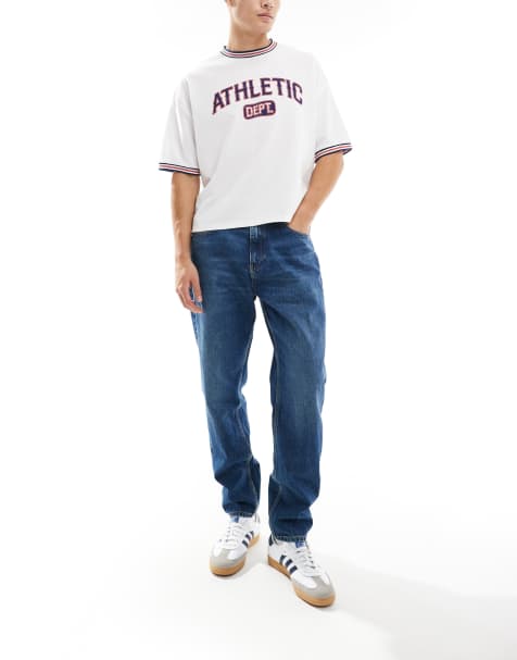 Tommy Jeans Isaac relaxed tapered jeans in dark wash - view 1
