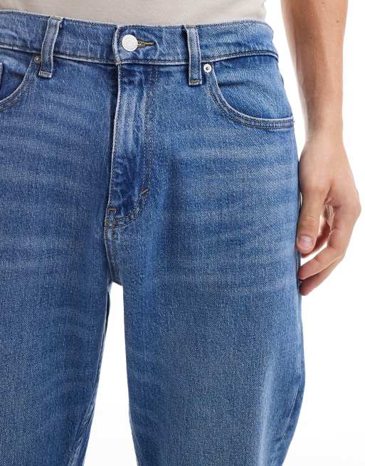 Tommy Jeans Isaac relaxed tapered jeans in mid wash, 5 of 5
