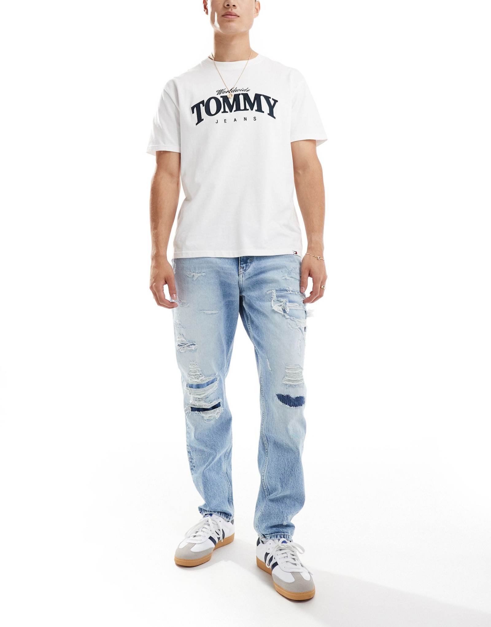 Зауженные потертые джинсы Tommy Jeans Isaac с легкой стиркой