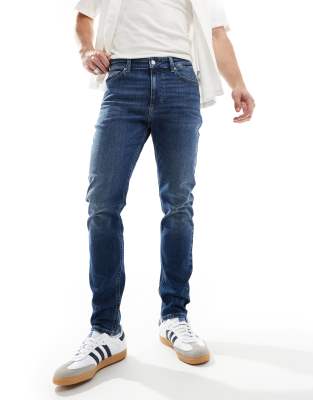 Tommy Jeans – Jeans in verblasstem Blau