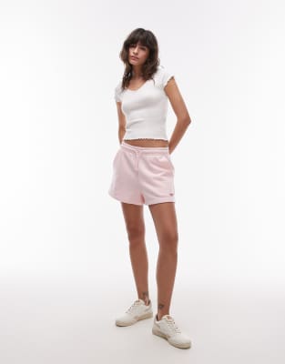 Tommy Jeans - Jersey-Shorts in Babyrosa mit Schriftzug-Logo