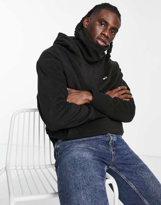 Tommy Jeans – Kapuzenpullover aus Polarfleece in Schwarz mit lockerem Schnitt und Stehkragen