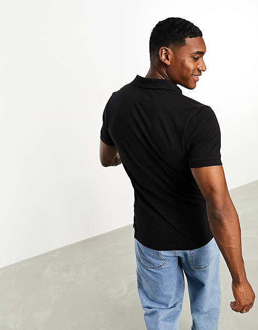 Tommy Jeans – Kurzärmeliges Poloshirt in Schwarz mit schmaler Knopfleiste |  ASOS
