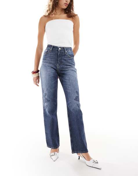 Tommy Jeans Layla high rise slim straight jeans with floral print in dark wash