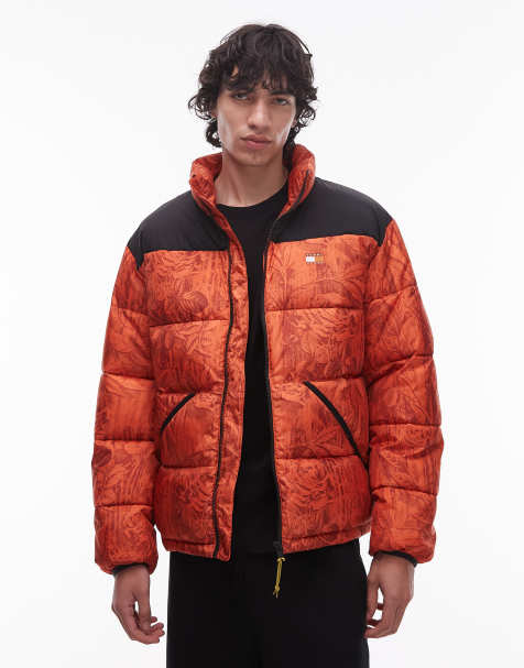 Tommy Jeans leafy all over print puffer jacket in orange - view 1