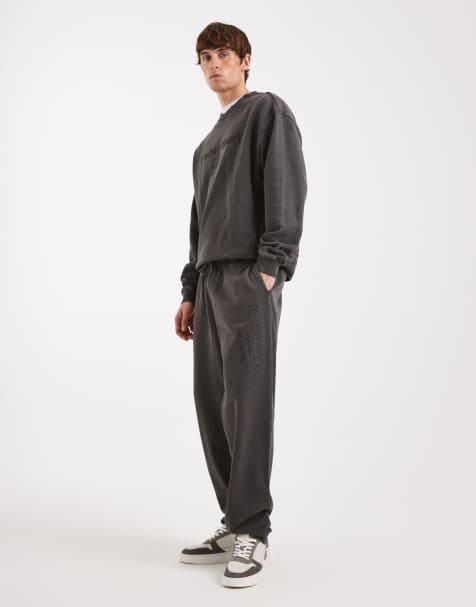 Tommy Jeans – Locker geschnittene Jogginghose in verwaschenem Schwarz mit Logo - view 1