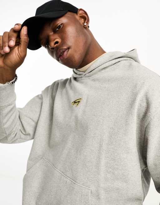 Tommy Jeans – Locker geschnittener Kapuzenpullover in Silbergrau mit Signatur