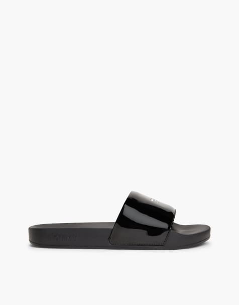 Tommy Jeans Logo patent slides in black - view 1