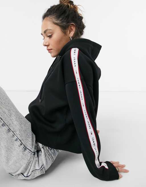 Tommy Jeans logo tape sleeve hoodie in black