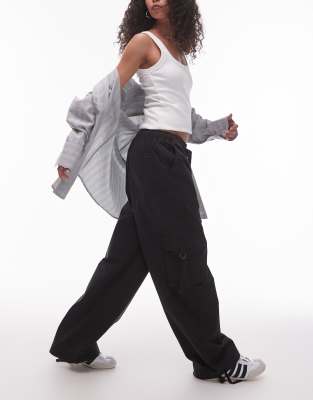 Tommy Jeans Loose cargo trousers in black - view 1