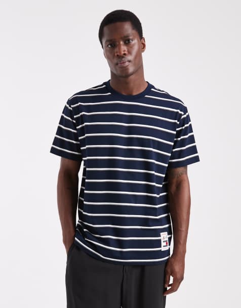 Tommy Jeans - Marineblå afslappet T-shirt med logomærke og striber - view 1