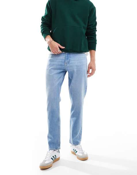 Tommy Jeans – Mellanblå avsmalnande dad jeans i regular fit - view 1