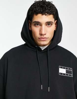 Tommy Jeans Metallic capsule back flag print hoodie relaxed fit in black ASOS