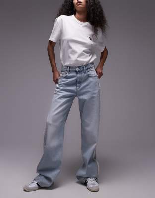 Tommy Jeans - Mia - Locker sitzende Jeans in ultraheller Waschung mit mittelhohem Bund, geradem Schnitt und ausgefranste...