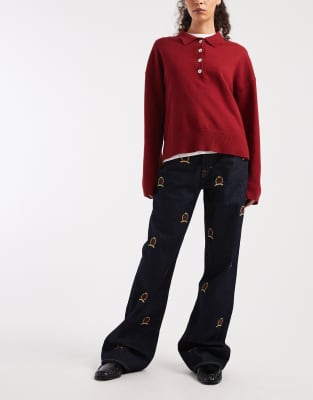 Tommy Jeans - Mia - Relaxed-Fit-Jeans in dunkler, indigoblauer Waschung mit All-over-Wappen-Print-Marineblau