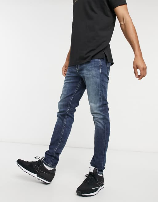 wash skinny Jeans in dark Tommy jeans | ASOS Miles