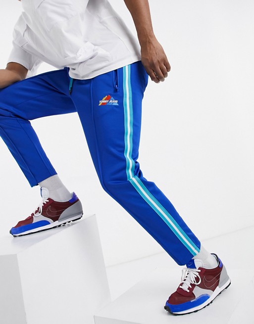 Tommy Jeans mountain logo side taping joggers in blue