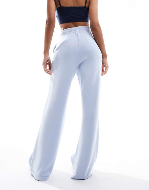 Tommy Jeans – Niebieskie spodnie dresowe z naszywką, 4 z 5