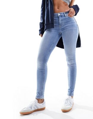Tommy Jeans Nora mid rise skinny jeans in light wash - ASOS Price Checker