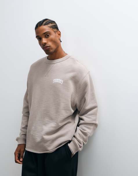 Tommy Jeans NYC logo sweatshirt med afslappet pasform og rund hals i beige - view 1